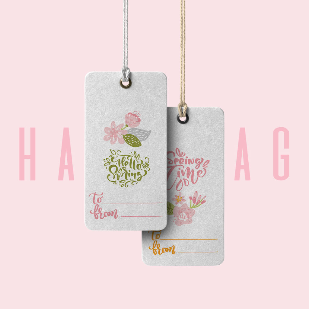 White hang tags with colorful text.
