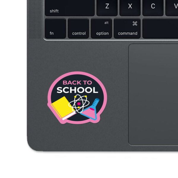 A sticker with the words "BACK TO SCHOOOL".