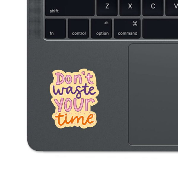 A sticker with the words "DON'T WASTE YOUR TIME"