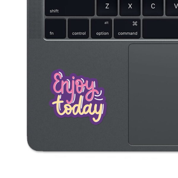 A sticker with the words "ENJOY TODAY".