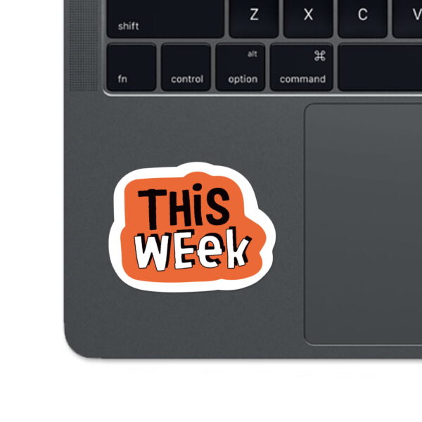 Black and white sticker "THIS WEEK".