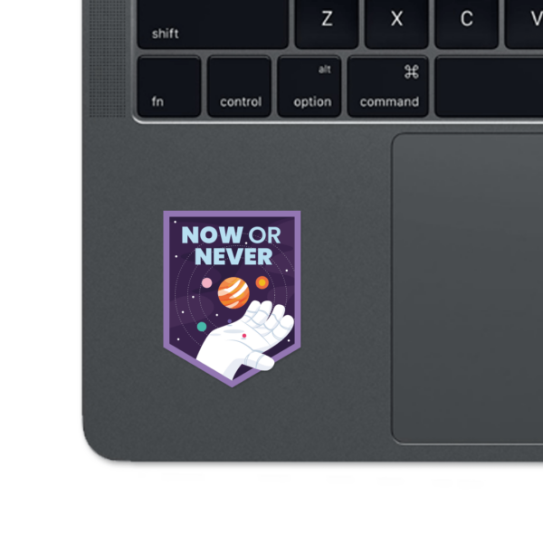 A sticker with the words "NOW OR NEVER"