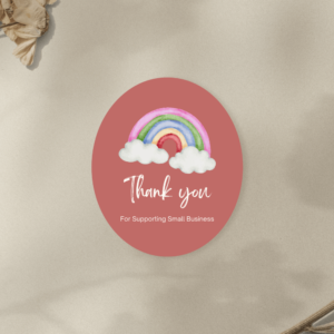 A brown oval label with white thank you text.