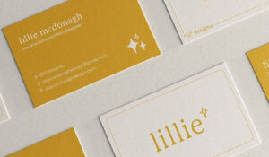 yellow and white business cards designed by Print Factory for Lillie Mcdonagh, a visual communication designer